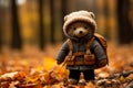 a teddy bear wearing a backpack in the woods