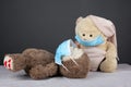 Teddy bears in medical masks,care symbol,covid-19