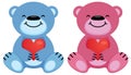 Teddy bears pink and blue hold the heart symbol in their paws