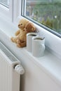 Teddy bears on radiator Royalty Free Stock Photo