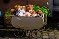 Teddy bears and toys in vintage baby carriage Royalty Free Stock Photo