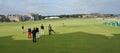 Teeing off at St. Andrews Golf Course, Scotland.