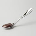 teel spoon containing chocolate pudding isolat , generated by AI