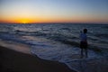 Teen with action camera on the sea. Royalty Free Stock Photo