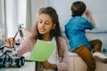 teen african american schoolgirl with notebook on stem