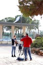 Teen age girl reporter talking in front of knesst