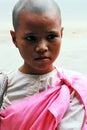 Teen-ager buddhist nun in Mandalay, Myanmar