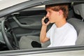 Teen behind the wheel on a cell phone