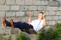 Teen with blond hair riding a chain swing2 Royalty Free Stock Photo