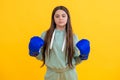 Teen boxer training with discipline and determination. teen girl in boxing goves. boxing training of teen girl. girl