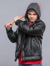 Teen boy in black leather jacket Royalty Free Stock Photo