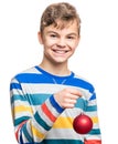 Teen boy with Christmas ball Royalty Free Stock Photo