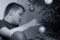 Teen Boy Decorating Christmas Tree Royalty Free Stock Photo