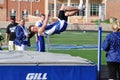 Teen Boy Doing the High Jump at Track Meet Royalty Free Stock Photo