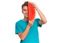 Teen boy eating watermelon