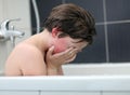 Teen boy experiencing a problem Royalty Free Stock Photo