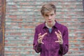 Teen boy explains his ideas Royalty Free Stock Photo