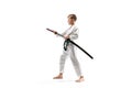 Teen boy fighting at aikido training in martial arts school