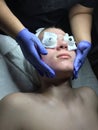 Teen boy getting facial and extractions Royalty Free Stock Photo