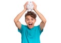 Teen boy holding piggy bank Royalty Free Stock Photo
