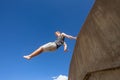 Teen Boy Jumping Blue Sky Royalty Free Stock Photo