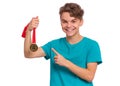 Teen boy with medal Royalty Free Stock Photo