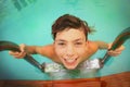 Teen boy in open air swimming pool close up portrait Royalty Free Stock Photo