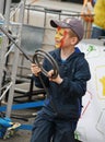 Teen boy with a painted under hero comic book marvel iron man face playing in the Playground municipal Park Royalty Free Stock Photo