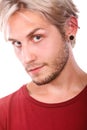 Teen boy with piercing and fashionable hairstyle Royalty Free Stock Photo