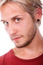 Teen boy with piercing and fashionable hairstyle Royalty Free Stock Photo