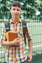 Teen boy portrait on the way to school, education and back to school concept Royalty Free Stock Photo