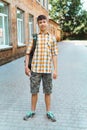 Teen boy portrait on the way to school, education and back to school concept Royalty Free Stock Photo