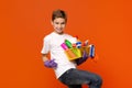 Teen boy in rubber gloves gesturing yes with detergents