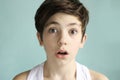 Teen boy with surprise grimace expression Royalty Free Stock Photo