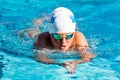 Teen boy swimming breaststroke. Royalty Free Stock Photo