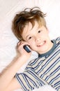 Teen boy talking on cell phone Royalty Free Stock Photo