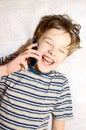 Teen boy talking on cell phone Royalty Free Stock Photo