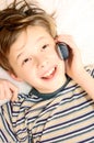 Teen boy talking on cell phone Royalty Free Stock Photo