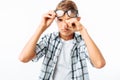 Teen boy than the upset wipes his hand tears, frustration after school, in the Studio on a white background Royalty Free Stock Photo