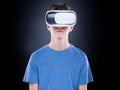 Teen boy in VR glasses