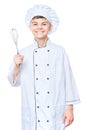 Teen boy wearing chef uniform Royalty Free Stock Photo