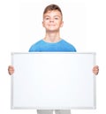 Teen boy with white blank Royalty Free Stock Photo