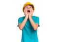 Teen boy with yellow hard hat