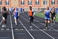 Teen Boys Competing in High School Sprint Race Royalty Free Stock Photo