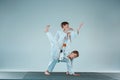 The two boys fighting at Aikido training in martial arts school. Healthy lifestyle and sports concept Royalty Free Stock Photo