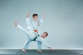 The two boys fighting at Aikido training in martial arts school. Healthy lifestyle and sports concept Royalty Free Stock Photo