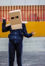 Teen with carton head mask Royalty Free Stock Photo