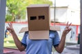 Teen with carton head mask Royalty Free Stock Photo