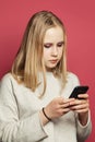 Teen with cell phone texting. Teenager girl with smartphone portrait Royalty Free Stock Photo