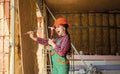 Teen child using hammer tool. building and repair tools. repairman. girl hammering a nail. small girl repairing in Royalty Free Stock Photo